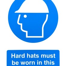 Hard hat safety sign made from rigid plastic suitable